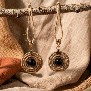 pendientes sol capim dourado Ónix